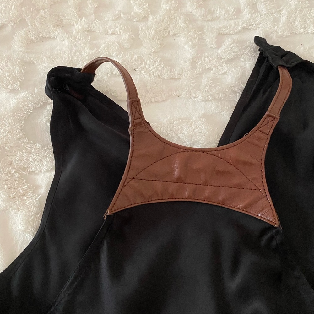 Ladies size small silk top.